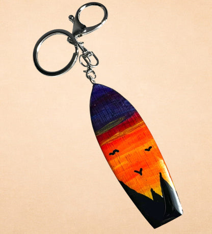 Llavero surf atardecer · Vuelo